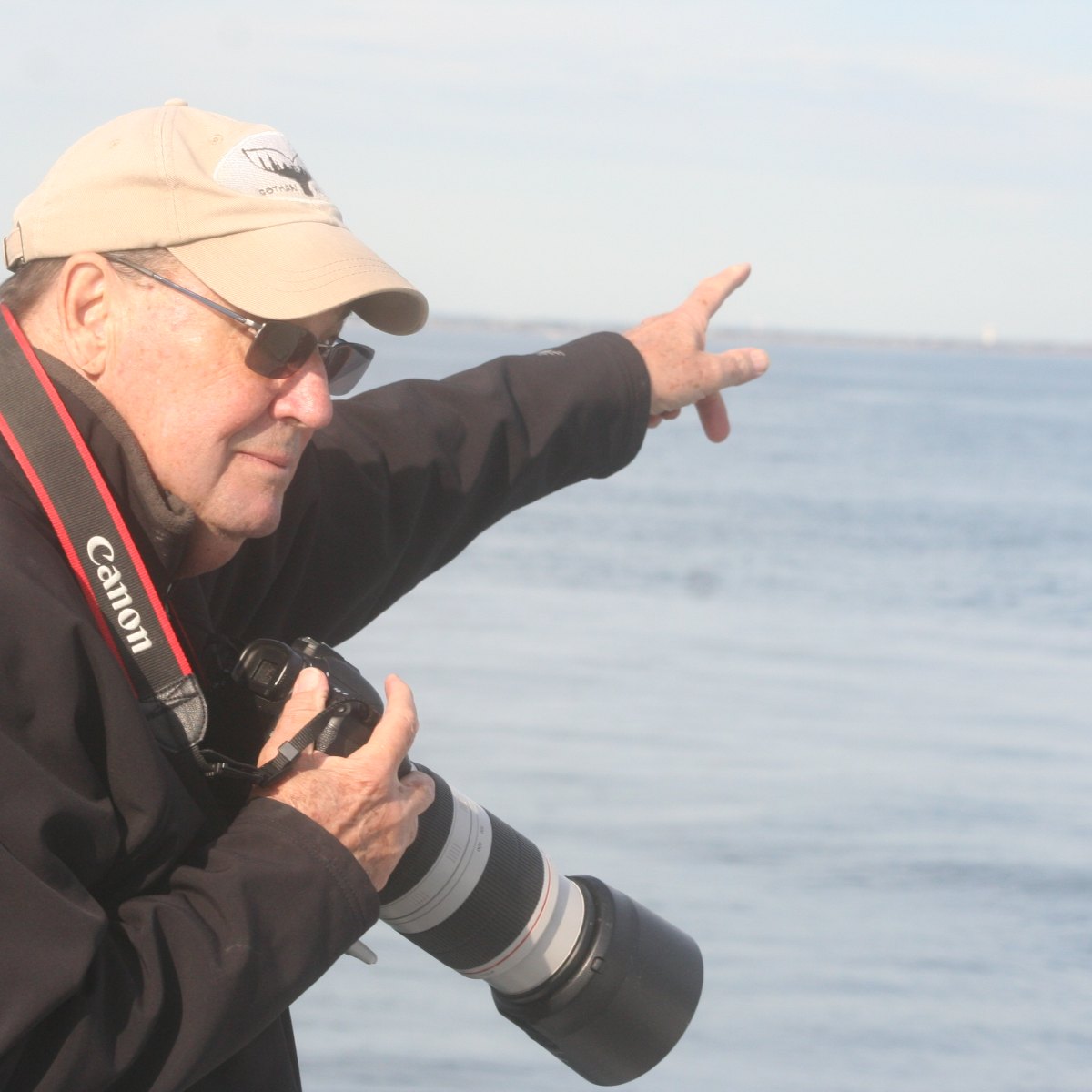 Paul L. Sieswerda Sr. on the water, scanning the horizon for whales